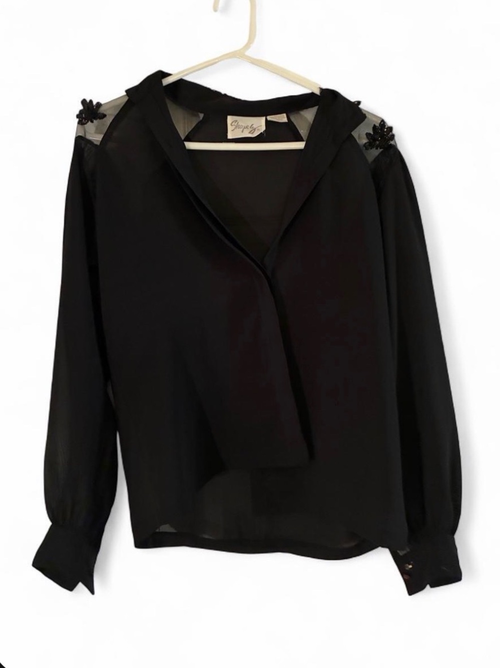 Black Long-Sleeve Cold-Shoulder Blouse with Floral Appliqué